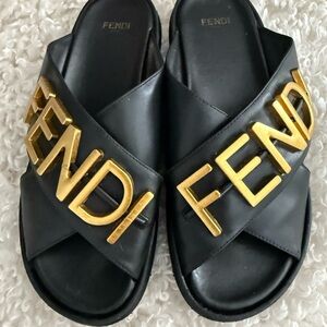 Fendi Black Leather Slides with Gold Logo Hardware